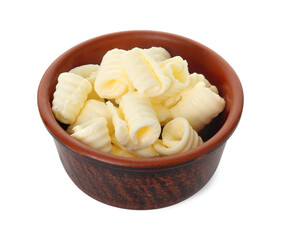 Tasty butter curls in bowl isolated on white