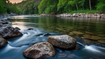 Serene river landscape with flowing water, rocks, and forest