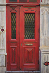 Obraz premium red wood door texture background