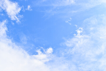 beautiful blue sky and white fluffy group of clouds with sunrise in the morning, natural background