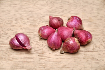 Onions on a wooden table in the kitchen