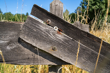 Old weathered wooden fence in the countryside