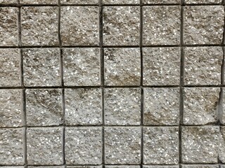 Cement brick mushroom finish mixed with mini pebbles Wall simple texture