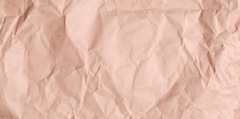 Fototapeta premium Texture of closed up paper background. Texture of brown crumpled craft paper.