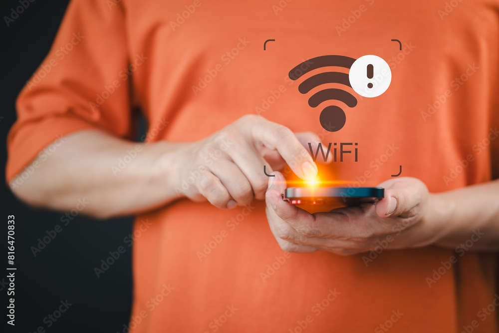 Leinwandbilder Man using mobile phone searching for wifi signal. But the mobile phone does not receive any signal. Technology communication concept of connected smartphone But no service.