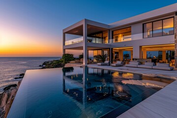 Fototapeta premium A stunning view of the ocean from an elegant modern mansion with sleek white walls
