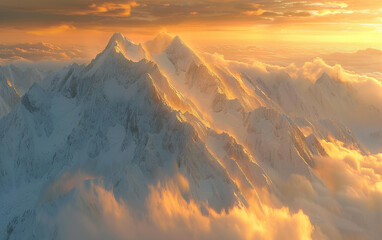 Beautiful mountain peaks in the clouds, a panoramic view of snowcapped mountains with a golden sunset light
