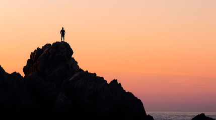 Silhouette of a man on some rocks on the coast of the Costa Brava in the province of Gerona in Spain during sunset : Generative AI