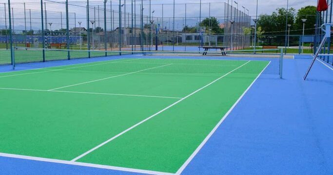 Part of the synthetic grass tennis court with markup