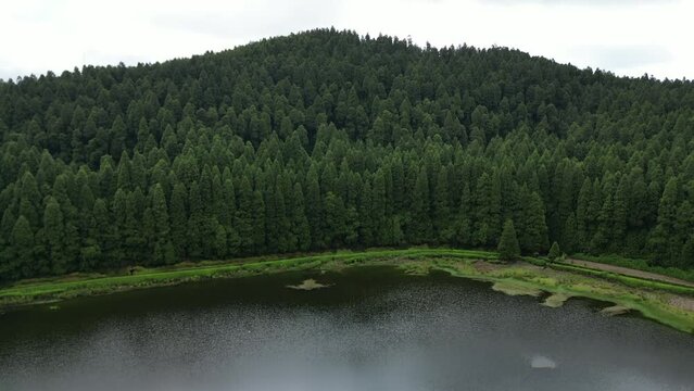 Drone view of Canario Lagoon. Lake formed by the crater of an old volcano in San Miguel island