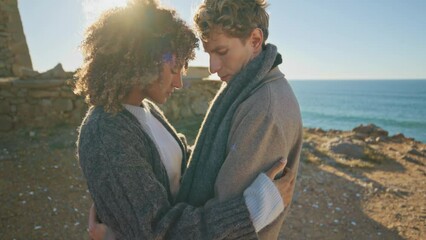 Closeup affectionate couple bonding posing camera on sea beach. Romantic date