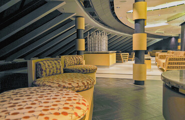 Thermal suite with heated loungers in mosaic tile design or relaxation chairs in spa or wellness...