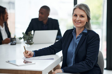 Mature woman, portrait and writing with documents in business at office for finance, contract or...