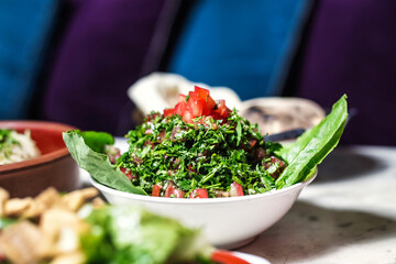 White Bowl Filled With Salad on Table