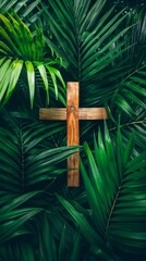 Palm Sunday concept. Wooden cross over palm leaves. Reminder of Jesus sacrifice and Christ resurrection. Easter passover. Eucharist concept.
