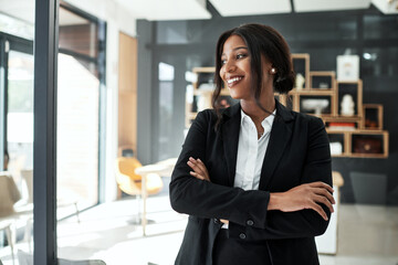 Arms crossed, business and black woman in office with thinking for career opportunity and corporate...