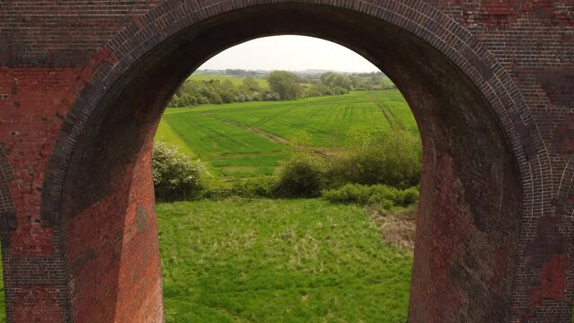 An aerial view of the Ledbury Viaduct bridge in England during daylight