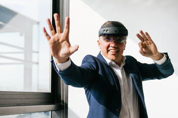 A businessman in a suit uses a VR headset, actively engaging with virtual reality technology in a...