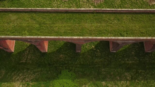 An aerial view of the Ledbury Viaduct bridge in England during daylight