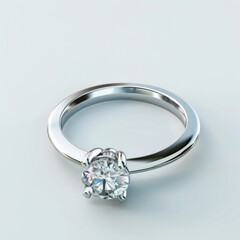 A white gold engagement ring featuring a brilliant cut diamond