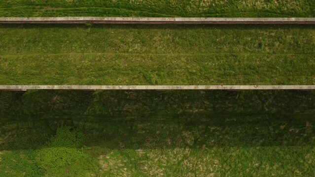 An aerial view of the Ledbury Viaduct bridge in England during daylight
