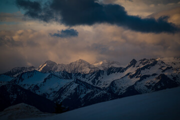orange sunrise in the austrian alps, the golden hour at a spring morning, with beautiful view of...