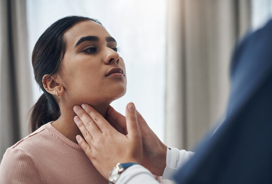 Nurse, woman and doctor with hand on throat, checking and thyroid issue or glands in healthcare appointment. Clinic, hospital exam and patient for wellness, infection and diagnosis with professional