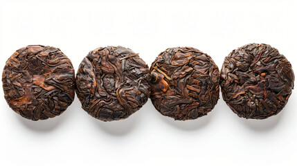 Four of tasty puer tea isolated on white top view