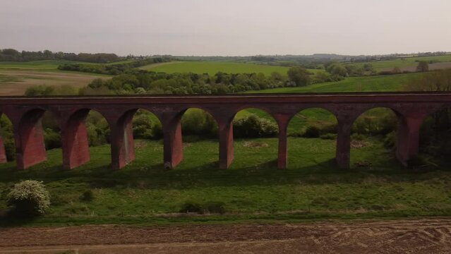 An aerial view of the Ledbury Viaduct bridge in England during daylight