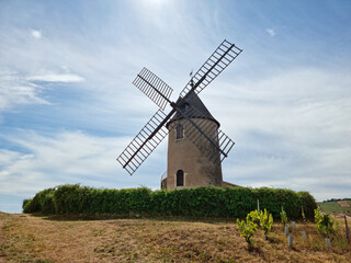 The eponymous windmill of famous french red wine situated near Romanèche-Thorins.