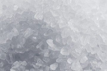 Pile of salt crystals closeup. Food background.