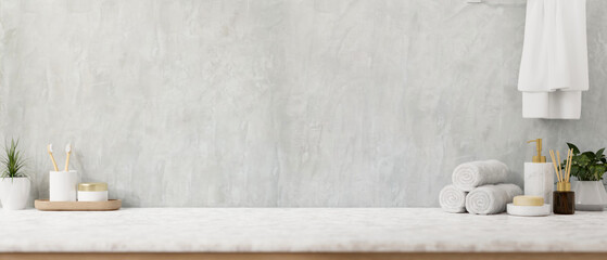 A modern luxurious bathroom table features a toiletry set and space for displaying products.