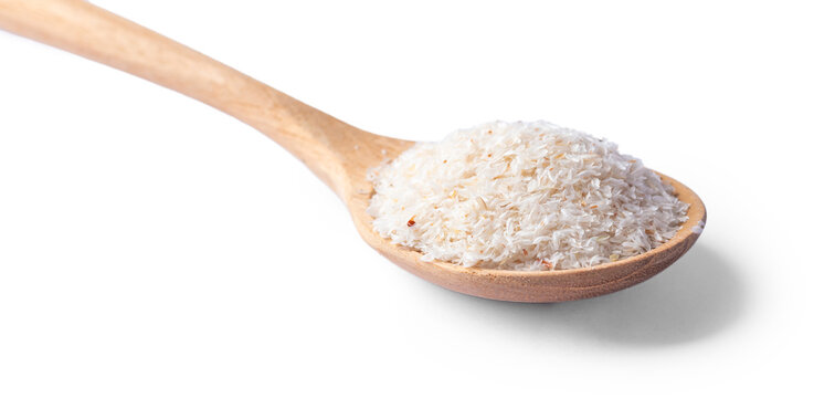 Psyllium husk in wood spoon, closeup isolated on white background