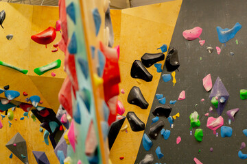 close up professional beautiful new climbing climber for training and training different wall colors