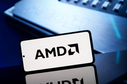 AMD company logo shown on phone screen. Advanced Micro Devices