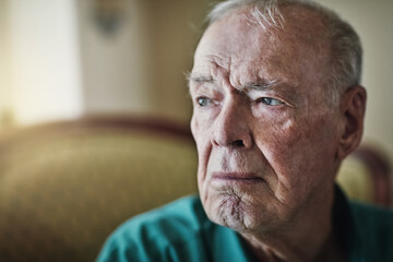 Elderly, man and sad with thinking of grief in retirement home with remember, nostalgia and memory...