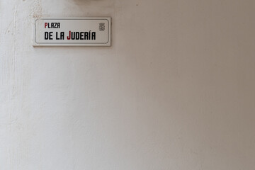 Street sign in Malaga, southern Spain, in Spanish which reads: Plaza of the Jews