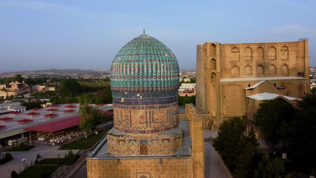 Aerial view of The Bibi-Khanym Mosque, dome, Khanum. One of the most important monuments of Samarkand, popular tourist destination of Central Asia. Samarkand, Uzbekistan view of the old town and road 