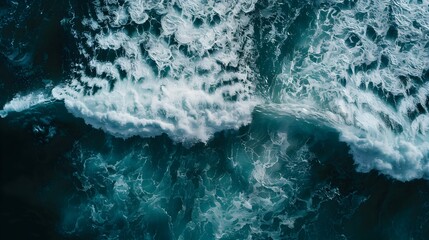 Top down aerial view of moody ocean wave