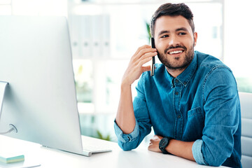 Businessman, computer and phone call in office for communication, project update and progress report. Male person, smiling and talking on mobile tech with pc for internet connection or online search