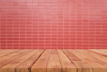 perspective wooden board over blurred orange block tile
