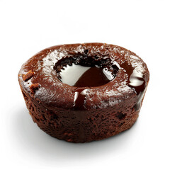 A chocolate lava cupcake with hot chocolate sauce white background