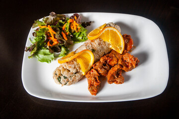 Savory Portuguese dish: Migas with crispy fried pork, a traditional comfort food. Perfect blend of flavors and textures.