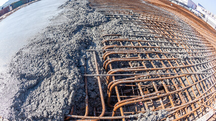 Construction New Building Flooring Foundations Steel Rebar Concrete Pouring Close-Up Outdoors