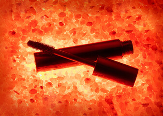 Black mascara on burning coals cosmetics