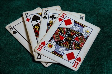 A blackjack table from the dealers perspective with cards dealt