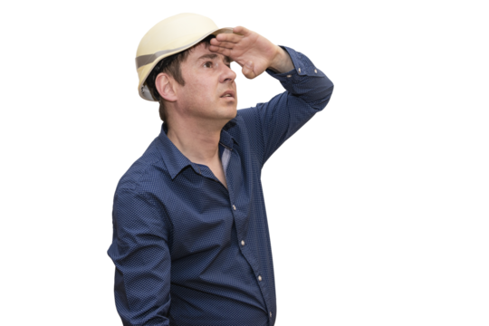 A man in a white hard hat intensely examines his hand, lost in thought. Isolated.