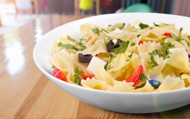 Tasty fresh pasta noodles dish with sauce and cheese
