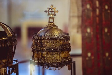 a very ornate looking object sitting on display at a museum