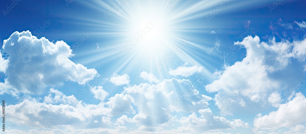 Poster sunny blue skies peek through wispy clouds in a captivating image offering ample copy space for a ve